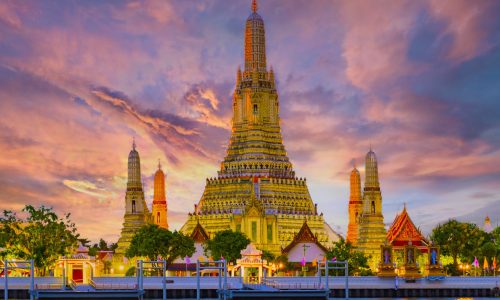 Wat Arun temple Bangkok during sunset in Thailand. Chao praya river